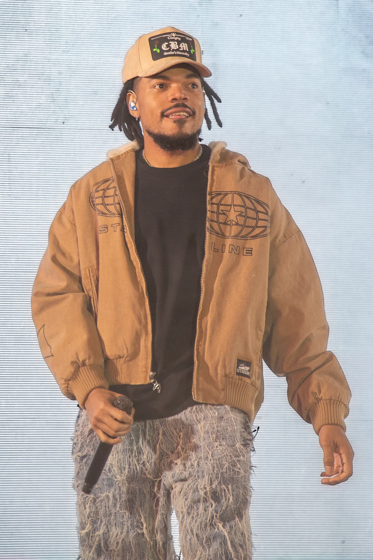 Chance the Rapper performing at Stir Cove in Council Bluffs on October 2, 2026.