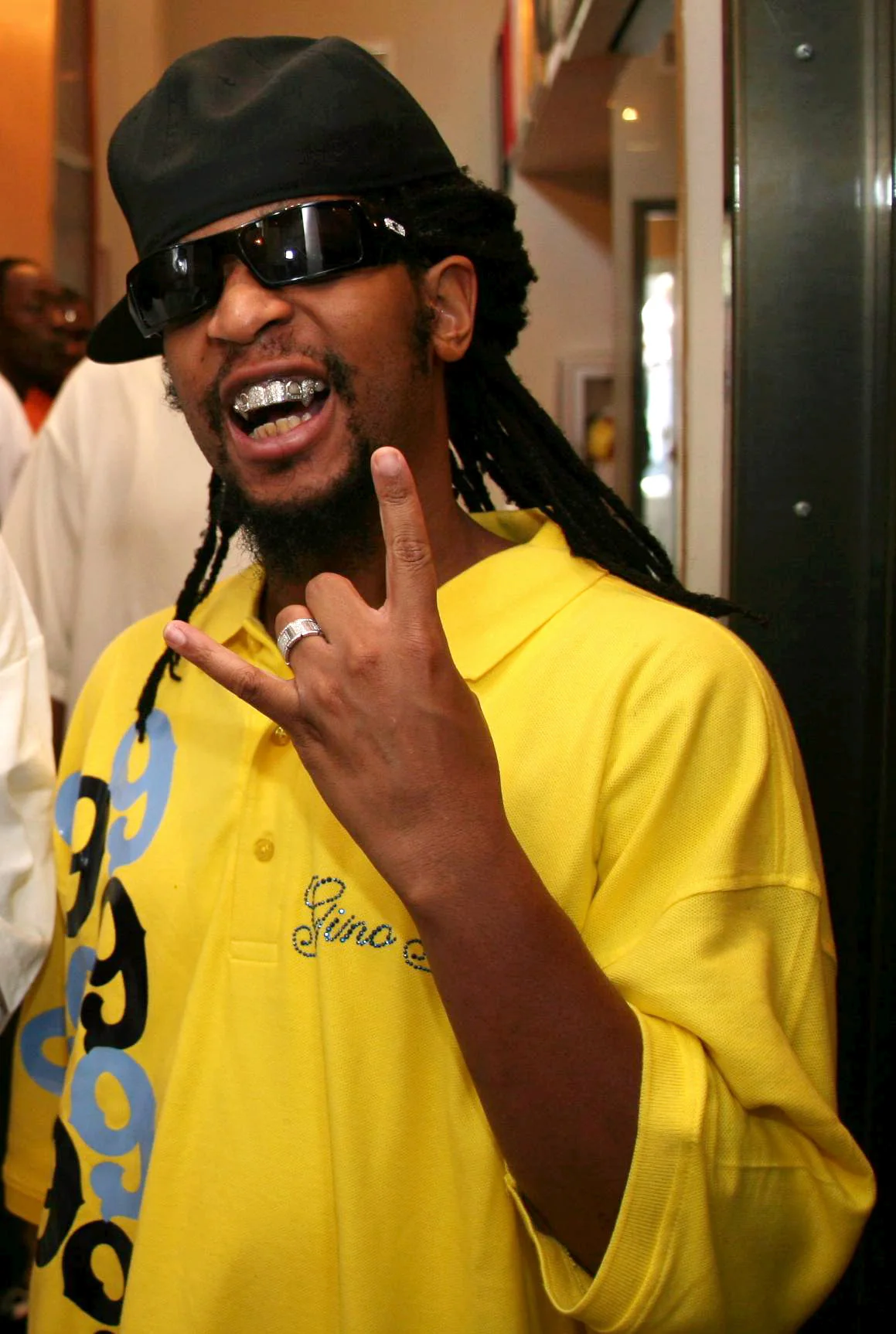 Lil Jon in sunglasses and a black cap at a 2007 event.